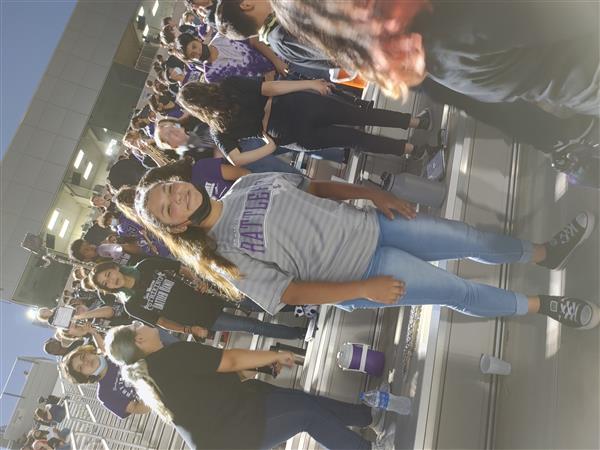Little Rattler Night: Middle School students in football stands.